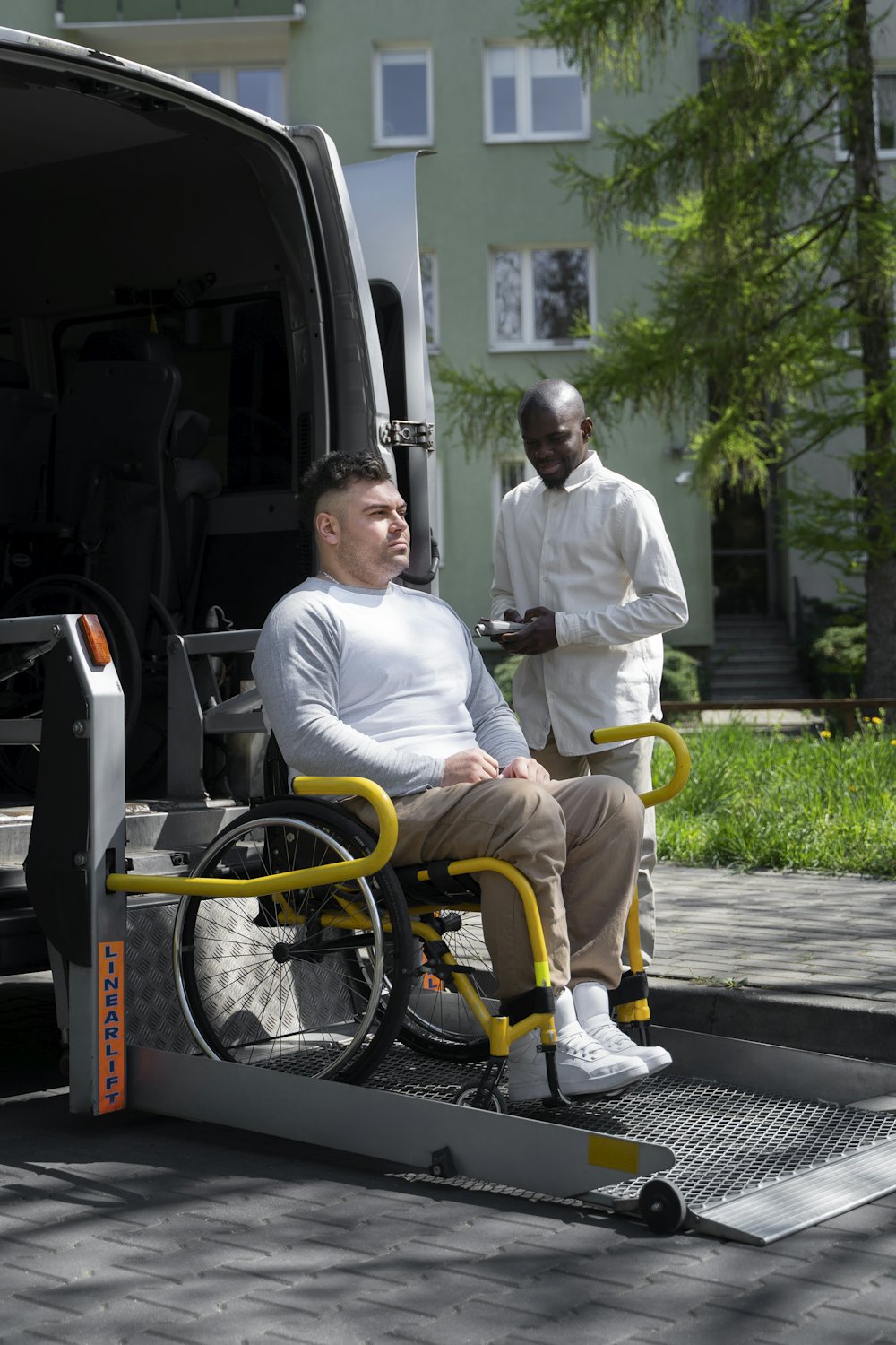Wheelchair-accessible van with boarding ramp